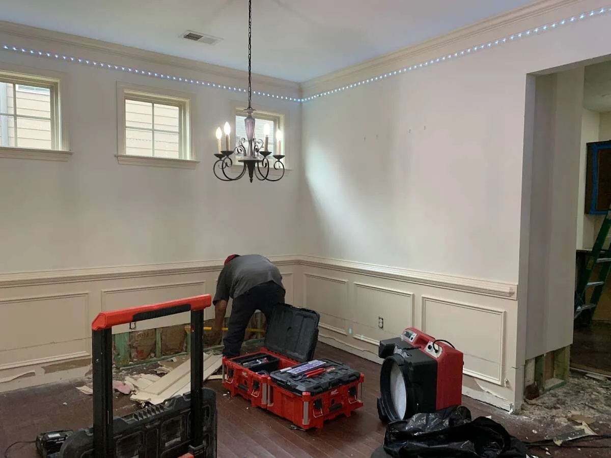 Restoration technician with professional equipment in Forest Park